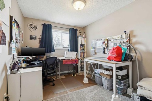 113-107 Elm Place, Okotoks, AB - Indoor Photo Showing Office