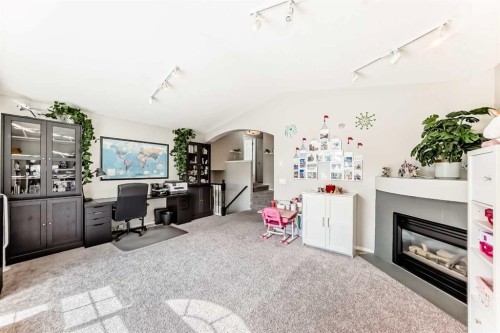 78 Arbour Butte Road Nw, Calgary, AB - Indoor With Fireplace