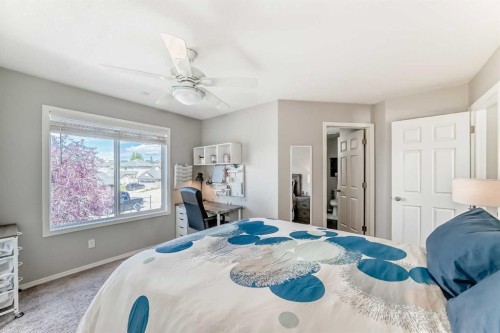 78 Arbour Butte Road Nw, Calgary, AB - Indoor Photo Showing Bedroom