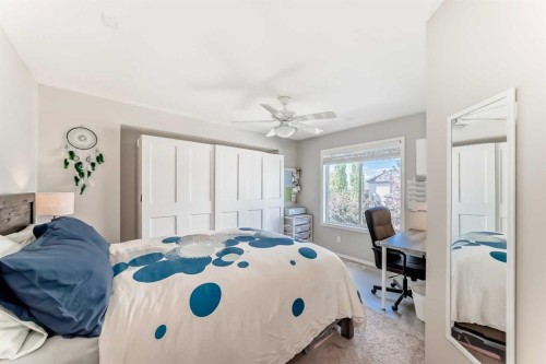 78 Arbour Butte Road Nw, Calgary, AB - Indoor Photo Showing Bedroom