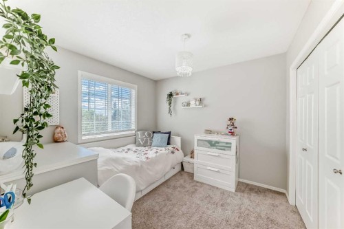 78 Arbour Butte Road Nw, Calgary, AB - Indoor Photo Showing Bedroom
