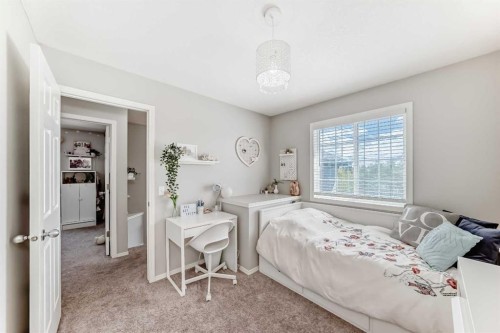 78 Arbour Butte Road Nw, Calgary, AB - Indoor Photo Showing Bedroom
