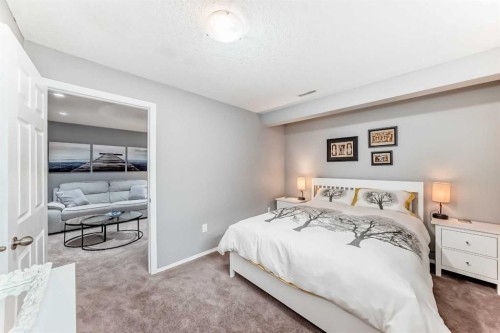 78 Arbour Butte Road Nw, Calgary, AB - Indoor Photo Showing Bedroom
