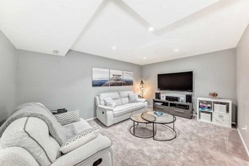78 Arbour Butte Road Nw, Calgary, AB - Indoor Photo Showing Living Room