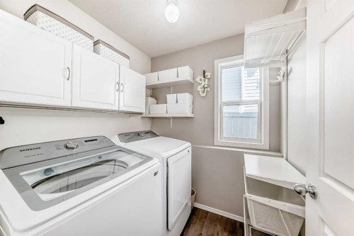 78 Arbour Butte Road Nw, Calgary, AB - Indoor Photo Showing Laundry Room