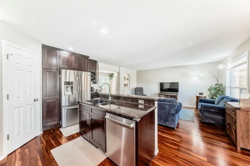 78 Arbour Butte Road Nw, Calgary, AB - Indoor Photo Showing Kitchen With Double Sink
