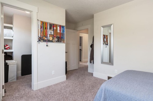 313 Centre Avenue Se, Airdrie, AB - Indoor Photo Showing Bedroom