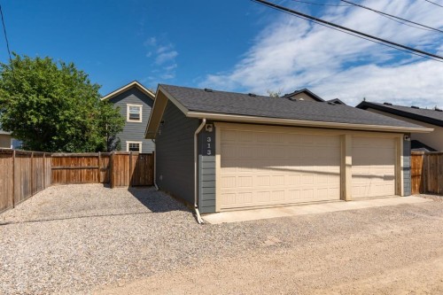 313 Centre Avenue Se, Airdrie, AB - Outdoor With Exterior