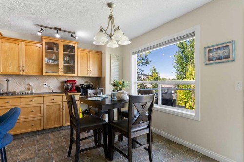 151 Bow Ridge Crescent, Cochrane, AB - Indoor Photo Showing Dining Room