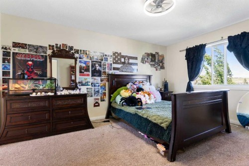 151 Bow Ridge Crescent, Cochrane, AB - Indoor Photo Showing Bedroom
