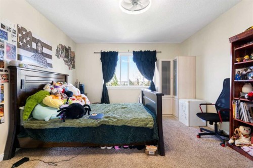 151 Bow Ridge Crescent, Cochrane, AB - Indoor Photo Showing Bedroom
