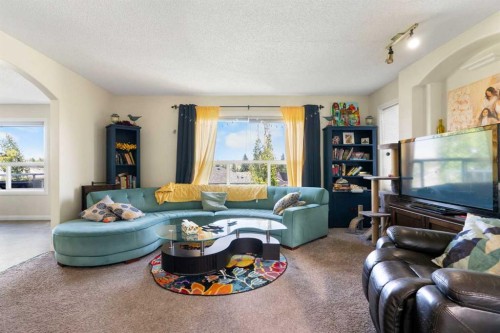 151 Bow Ridge Crescent, Cochrane, AB - Indoor Photo Showing Living Room