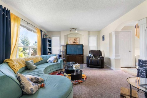 151 Bow Ridge Crescent, Cochrane, AB - Indoor Photo Showing Living Room