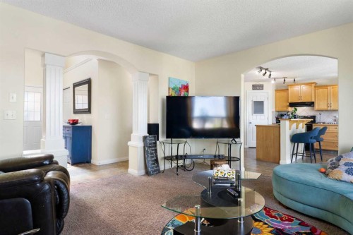 151 Bow Ridge Crescent, Cochrane, AB - Indoor Photo Showing Living Room