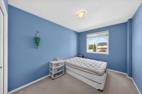 76 Country Village Lane Ne, Calgary, AB - Indoor Photo Showing Bedroom