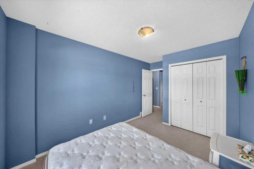 76 Country Village Lane Ne, Calgary, AB - Indoor Photo Showing Bedroom