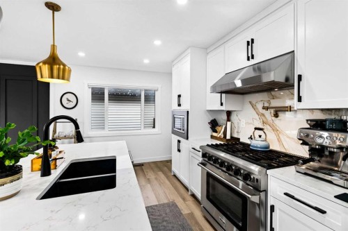 9512 Academy Drive Se, Calgary, AB - Indoor Photo Showing Kitchen With Double Sink With Upgraded Kitchen