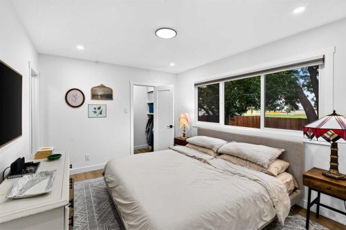 9512 Academy Drive Se, Calgary, AB - Indoor Photo Showing Bedroom