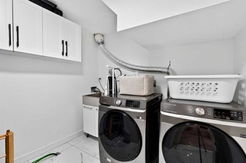 9512 Academy Drive Se, Calgary, AB - Indoor Photo Showing Laundry Room