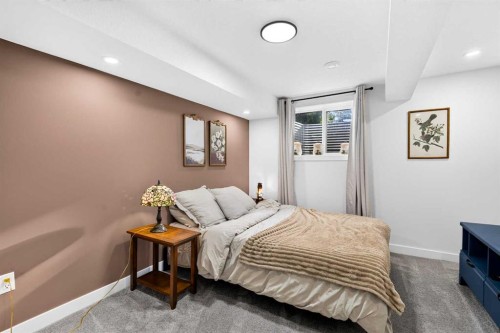 9512 Academy Drive Se, Calgary, AB - Indoor Photo Showing Bedroom