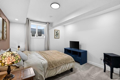 9512 Academy Drive Se, Calgary, AB - Indoor Photo Showing Bedroom
