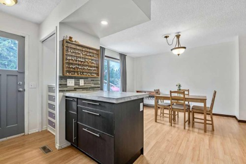 311 Penbrooke Crescent Se, Calgary, AB - Indoor Photo Showing Dining Room