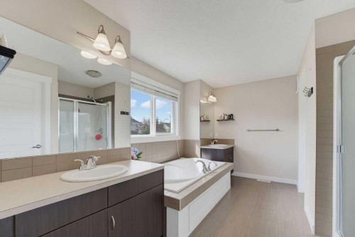 145 Sunset Manor, Cochrane, AB - Indoor Photo Showing Bathroom
