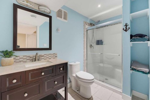 145 Sunset Manor, Cochrane, AB - Indoor Photo Showing Bathroom
