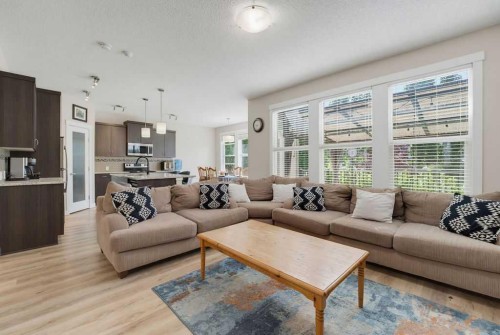 145 Sunset Manor, Cochrane, AB - Indoor Photo Showing Living Room