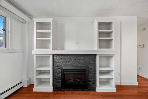 14-2906 17 Avenue Sw, Calgary, AB - Indoor Photo Showing Living Room With Fireplace