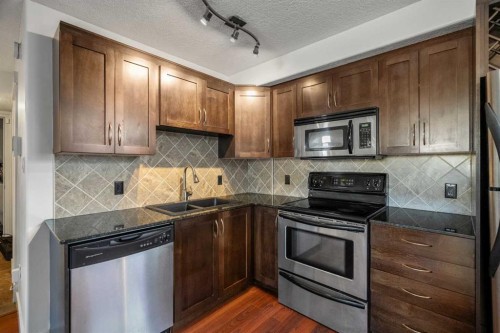 14-2906 17 Avenue Sw, Calgary, AB - Indoor Photo Showing Kitchen With Stainless Steel Kitchen With Double Sink