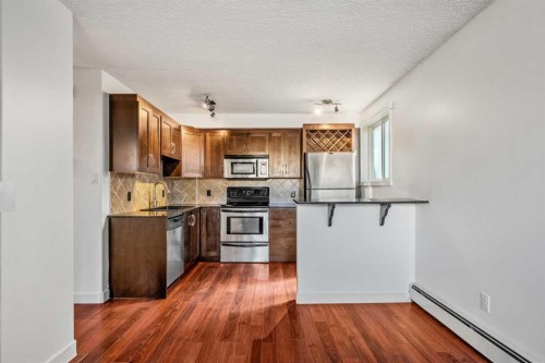 14-2906 17 Avenue Sw, Calgary, AB - Indoor Photo Showing Kitchen With Stainless Steel Kitchen