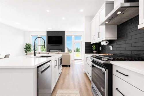 267 Belmont Heath Sw, Calgary, AB - Indoor Photo Showing Kitchen With Upgraded Kitchen
