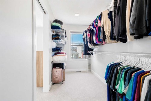 267 Belmont Heath Sw, Calgary, AB - Indoor With Storage