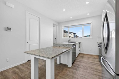 128 Setonstone Manor Se, Calgary, AB - Indoor Photo Showing Kitchen