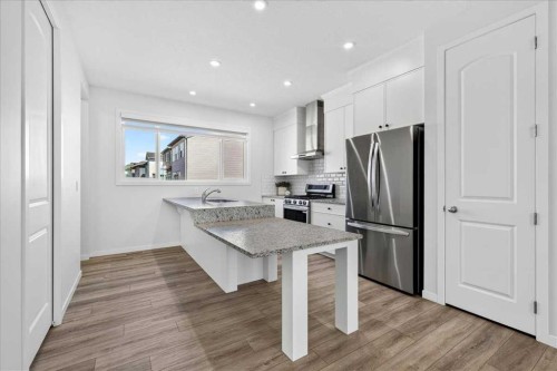 128 Setonstone Manor Se, Calgary, AB - Indoor Photo Showing Kitchen With Stainless Steel Kitchen With Upgraded Kitchen
