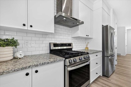 128 Setonstone Manor Se, Calgary, AB - Indoor Photo Showing Kitchen With Stainless Steel Kitchen With Upgraded Kitchen