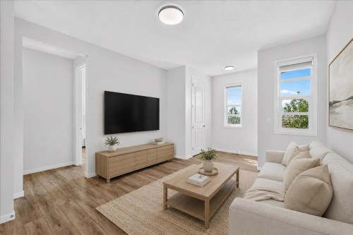 128 Setonstone Manor Se, Calgary, AB - Indoor Photo Showing Living Room