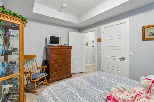 7 Bishop Circle, Carstairs, AB - Indoor Photo Showing Bedroom