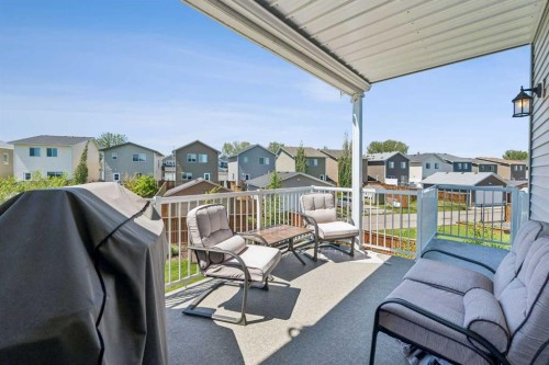7 Bishop Circle, Carstairs, AB - Outdoor With Deck Patio Veranda With Exterior