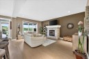 146 Valley Pointe Way Nw, Calgary, AB  - Indoor Photo Showing Living Room With Fireplace 