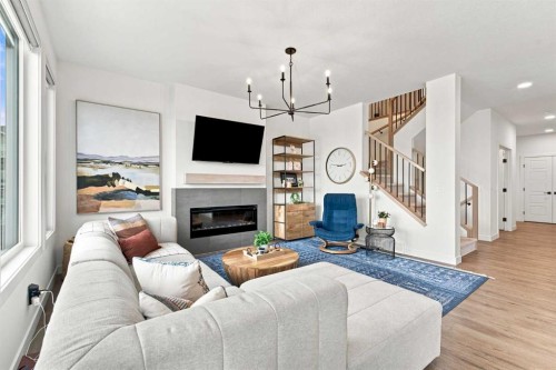 826 Alpine Drive Sw, Calgary, AB - Indoor Photo Showing Living Room With Fireplace