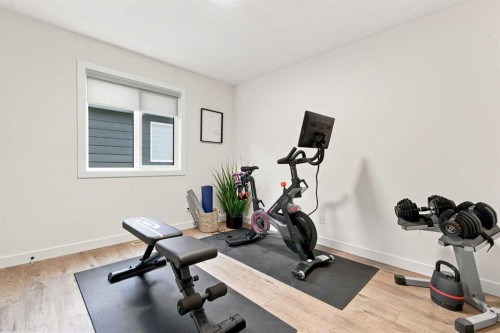 826 Alpine Drive Sw, Calgary, AB - Indoor Photo Showing Gym Room