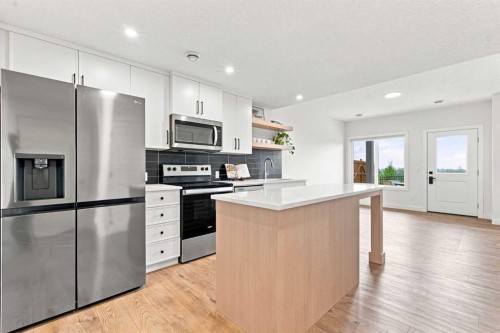 826 Alpine Drive Sw, Calgary, AB - Indoor Photo Showing Kitchen With Stainless Steel Kitchen With Upgraded Kitchen