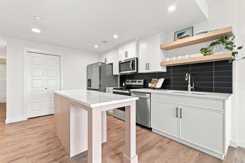 826 Alpine Drive Sw, Calgary, AB - Indoor Photo Showing Kitchen With Stainless Steel Kitchen