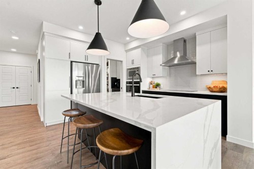 826 Alpine Drive Sw, Calgary, AB - Indoor Photo Showing Kitchen With Stainless Steel Kitchen With Upgraded Kitchen