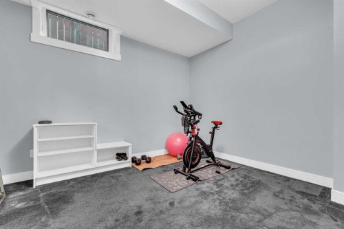 2417 25 Avenue Nw, Calgary, AB - Indoor Photo Showing Gym Room