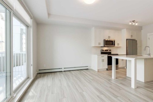 107-500 Auburn Meadows Common Se, Calgary, AB - Indoor Photo Showing Kitchen With Stainless Steel Kitchen