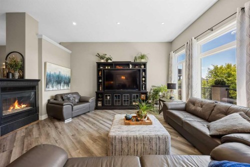 469 Rainbow Falls Way, Chestermere, AB - Indoor Photo Showing Living Room With Fireplace