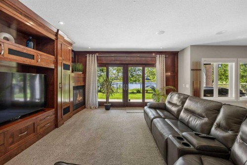 469 Rainbow Falls Way, Chestermere, AB - Indoor Photo Showing Living Room With Fireplace